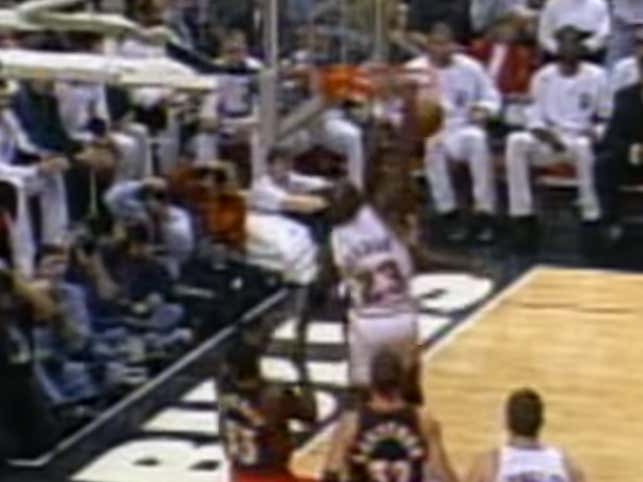 michael jordan dunking on dikembe mutombo