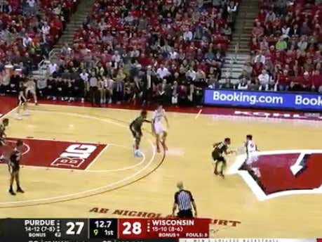 Wisconsin hits a layup on their final shot of the half to cover 1H -2 and hit the 1H over (56)