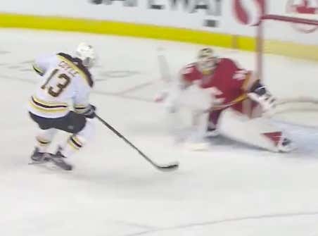 Charlie Coyle goes glove side and just like that the Flames and Bruins have hit the over (5.5) with still time to play in the 1P