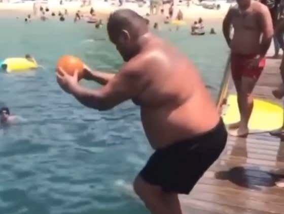 Check Out This Chunky Fella Launching A Beach Ball To The Moon