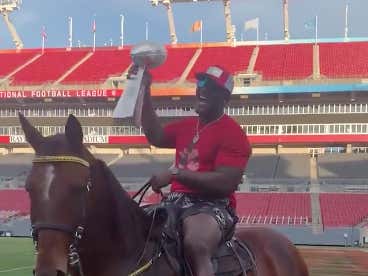 Bucs LB Devin White Rode His Horse On The Field In Raymond James Stadium Holding The Lombardi Trophy
