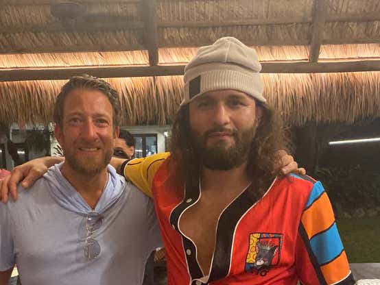 Couple miami guys doing miami stuff. Great night to eat great food, drink and smoke with friends. Not a care about Tv or winter or winter sports. Just another day in paradise