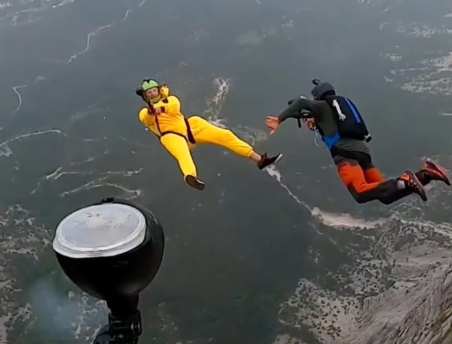 The Most Epic Thing You'll See today: BASE Jumping while Playing Paintball