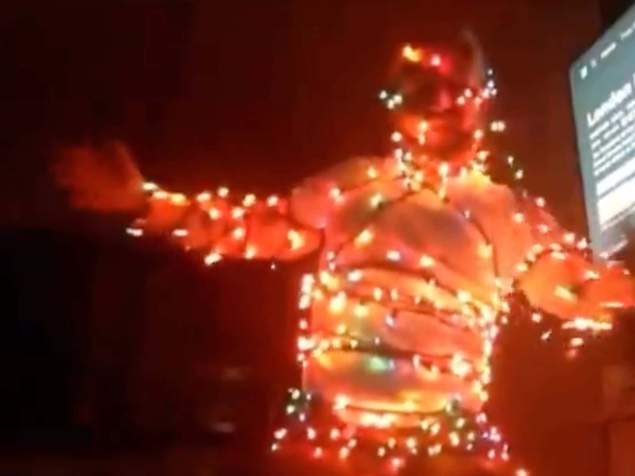 Man Wraps Himself In Electrical Wires for his Fans on Christmas Eve