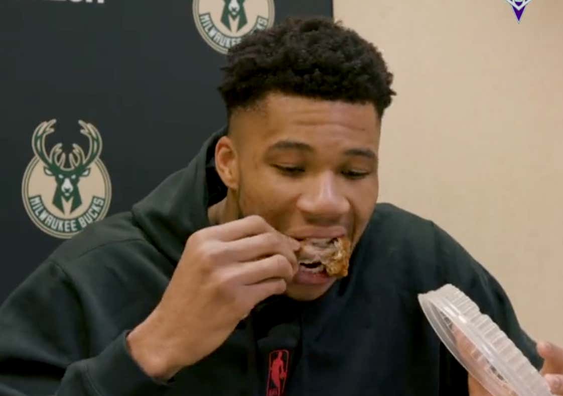 Giannis Not Giving A Shit And Eating Wings During His Postgame Presser After The Bucks Got Destroyed Is Why He's The Greatest