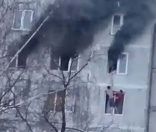 Absolutely WILD Video Of Two Guys Saving A Woman From The 9th Floor Of A Burning Building In Moscow