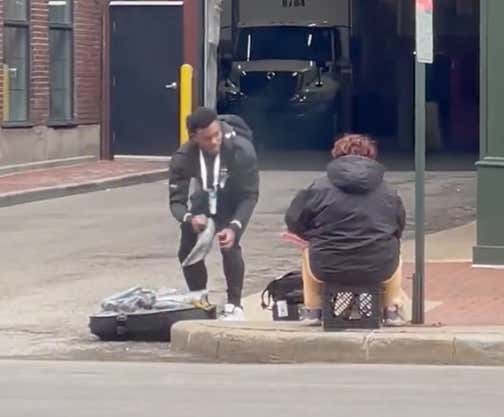 Malik Willis Stopping On The Street Outside Of The Combine To Give Clothes To An Apparent Homeless Person Is True QB1 Stuff