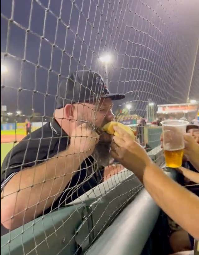 Joe West Announces He Is Going To Unretire After Seeing This Umpire Chow Down On A Hot Dog And Beer Through The Screen During A Game
