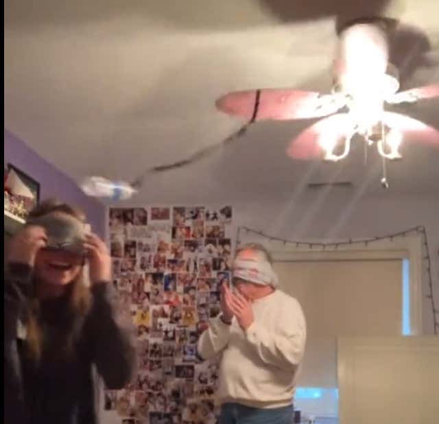 Blindfolding 2 People Then Turning On A Ceiling Fan With A Water Bottle Attached To It Is The Sport Of The Future