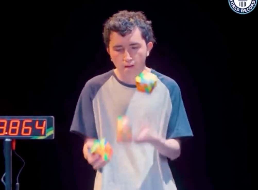 This Kid Solving 3 Rubik's Cubes At The Same Time While Juggling Is Currently The Best Athlete On The Planet