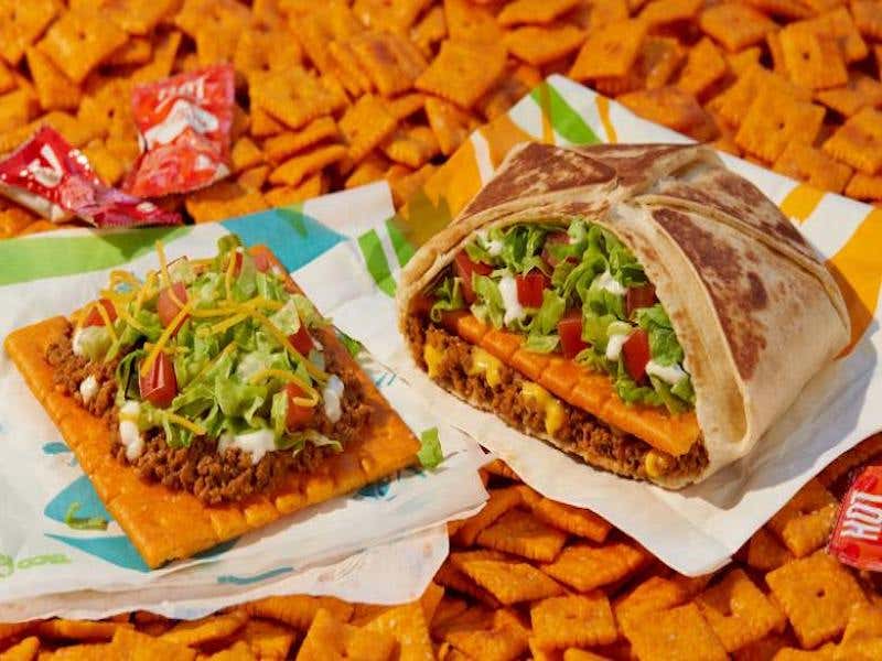 GAME CHANGER: Taco Bell's Latest Creations Are A Giant Cheez-It Crunchwrap Supreme And A Giant Cheez-It Tostada That Are 16 TIMES Bigger Than A Regular Cheez-It