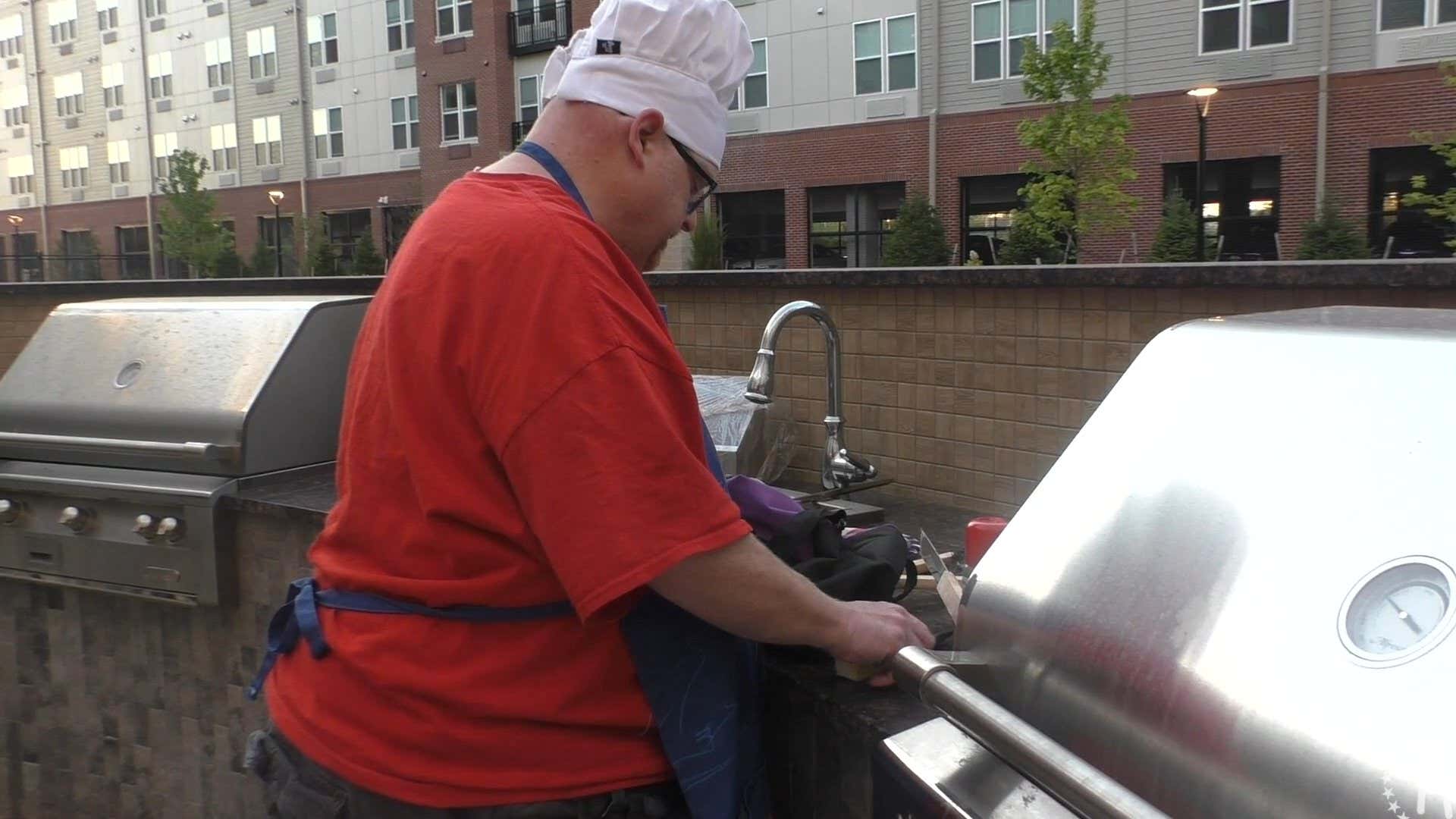 Tank Cooks Steak on the Grill