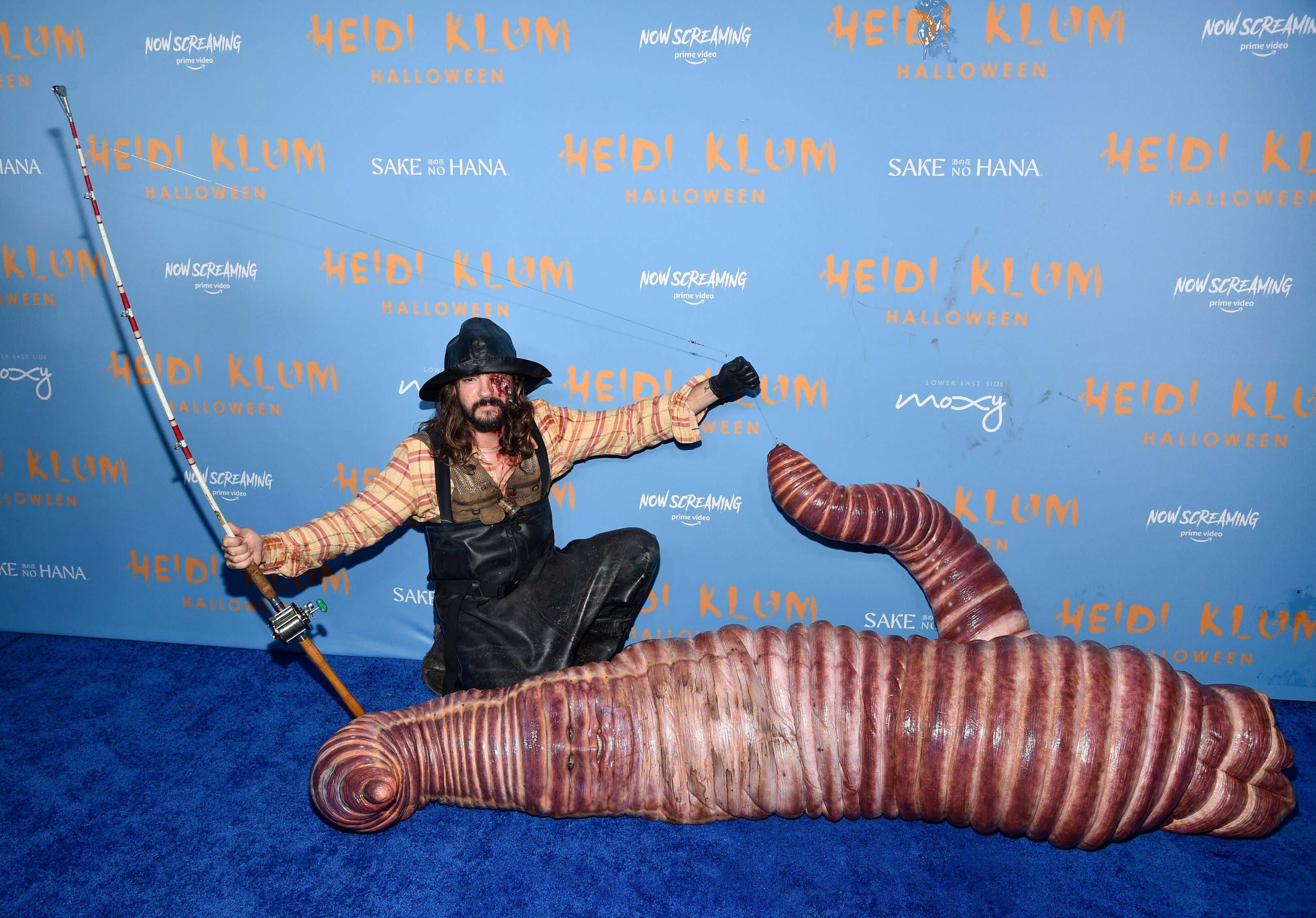 Heidi Klum Continues To Have The Most Ridiculous Costume Of The Year, This Time Dressing As A Life Sized Worm On A Hook