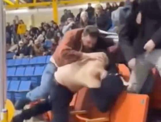 Reason #1 Why Hockey Fans Should Leave Fighting To The Players: Idiot Knocks Himself Out While Brawling In The Stands