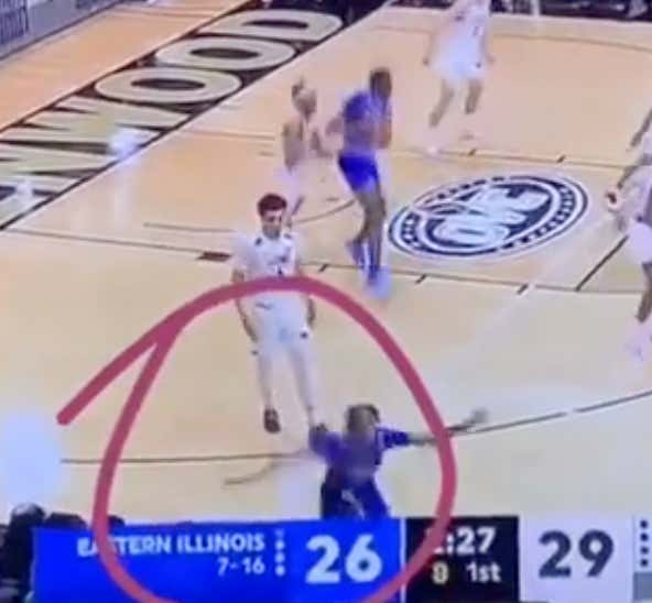 One Of The Wildest College Hoops Clips You'll See - EIU Player Unloads A Massive Slap On A Fan While Teammate Dunks All Over Someone