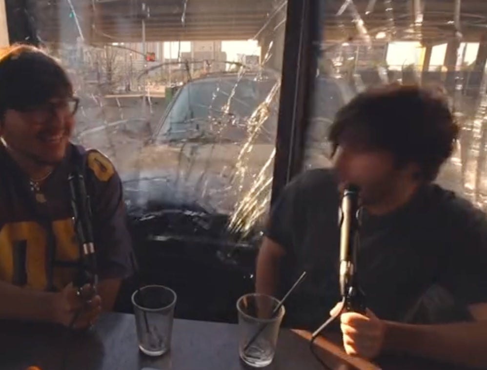 WILD Video Of A Car Crashing Through A Coffee Shop While Two People Were Recording A Podcast