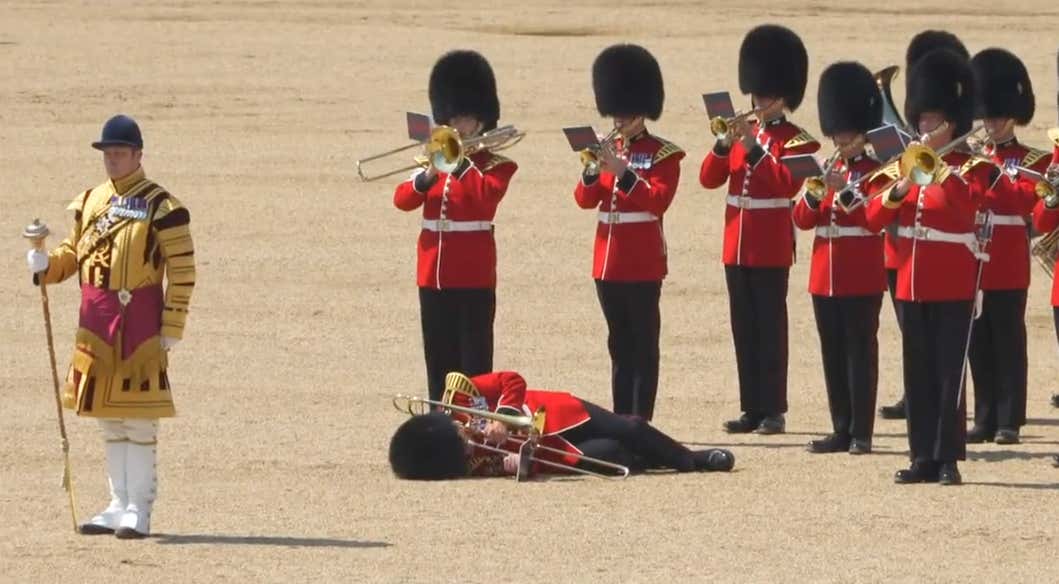 This Royal Guard Trombonist Who Passed Out Then Started Performing Once He Woke Up And Turned Down A Stretcher Can Play Music For My Team Any Day Of The Week