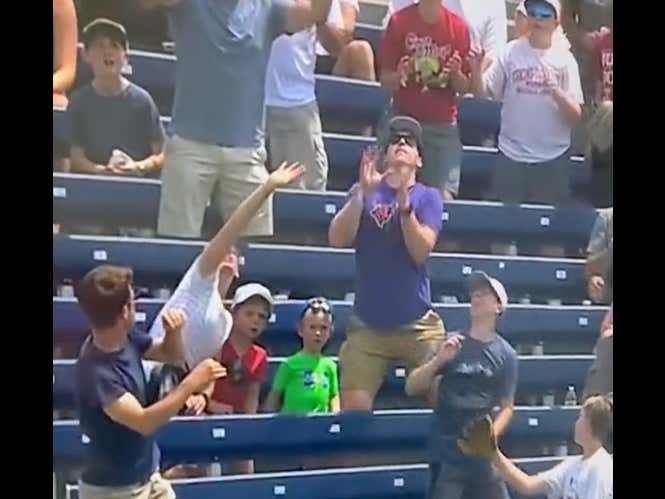 Watch This Dad At The College World Series Botch The Most Embarrassing Catch Attempt Of All Time And Then Land On His Kid's Head