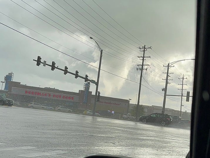 This Visual Of A Tornado Bearing Down On A Fully Packed Portillo's Drive Through Is So Chicago It Hurts