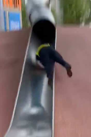 Watch: Boston Cop Gets Absolutely BUNDLED Trying To Go Down The New Slide At City Hall