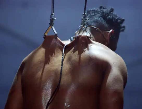 Musical Artist Miguel Shoved Massive Hooks THROUGH THE SKIN OF HIS BACK and Suspends Himself From The Ceiling at His Own Concert