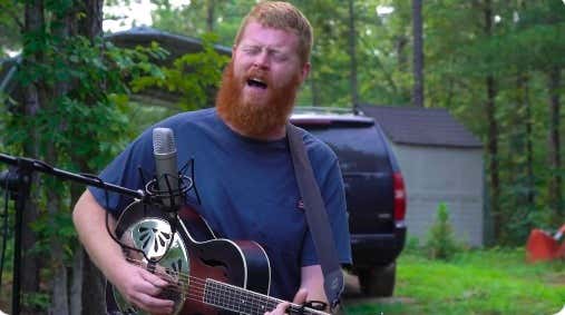 Oliver Anthony, Singer of the Protest Song of the Decade, Laughs With Joe Rogan About What it's Like to Be in the Middle of a National Fight Over His Music