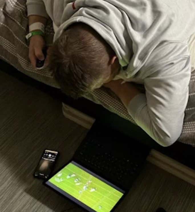 FOOTBALL GUY: Dolphins QB Coach Was Forced To Spend Most Of His Days Lying Face Down After Detached Retina Surgery But He Still Managed To Watch Game Film