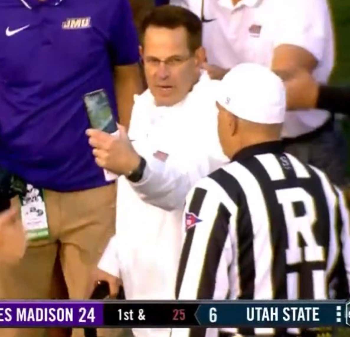 James Madison's Coach Was So Upset With The Refs For Missing A Call That He Whipped Out A Cell Phone To Prove They Were Wrong