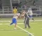 WATCH: A High School Ref Went Full WWE And Ripped A Kid's Helmet Off In The Middle Of A Play