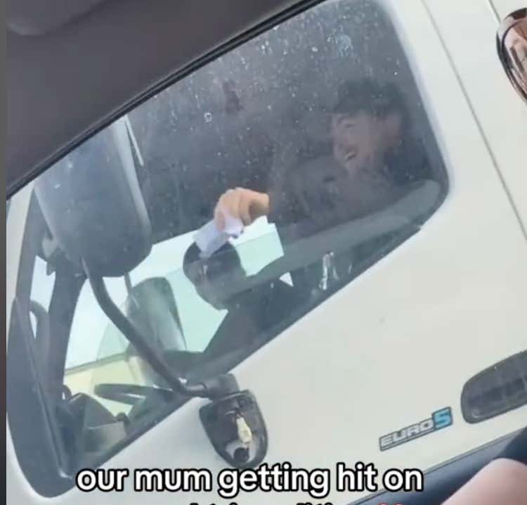 This Truck Driver Trying To Get A MILF's Number On The Highway Is The Horniest Man Alive