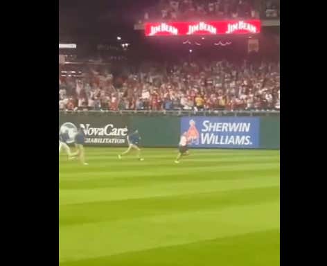 Phillies Fan Gets Bet $1,000 To Rush The Field And It's SHOCKING How Quickly He Hops The Rail