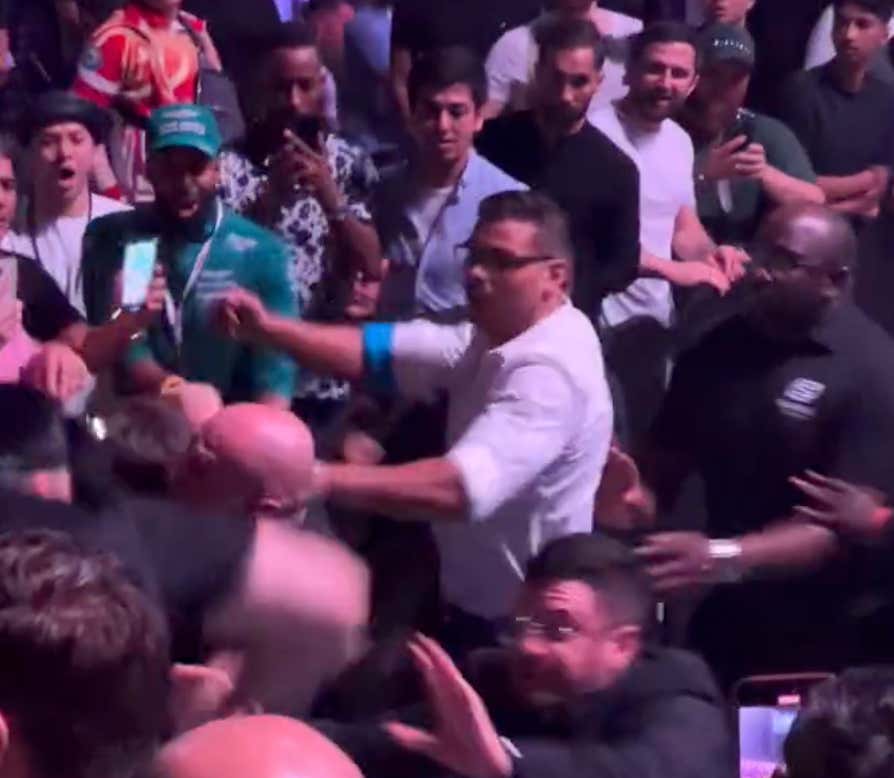 Fan Dives Over The Barricade At UFC 294 To Throw A Wild Punch At Paulo Costa