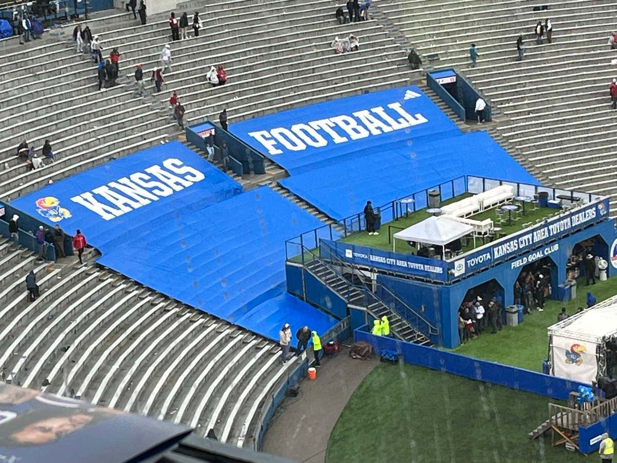 The Fun Police At Kansas Won't Let This Fan Slide Down The Tarp During A Rain Delay