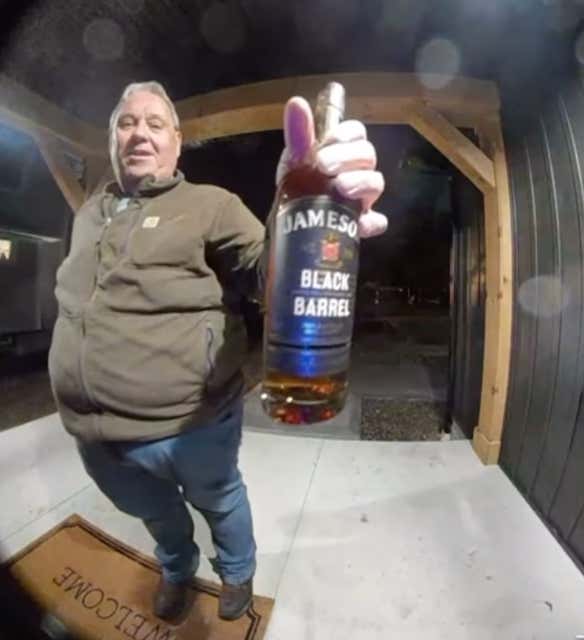 Watch: Awesome Video Of An Old Man Showing Up To His Neighbor's House With A Bottle Of Whiskey Because He Thought He Was Having A Party