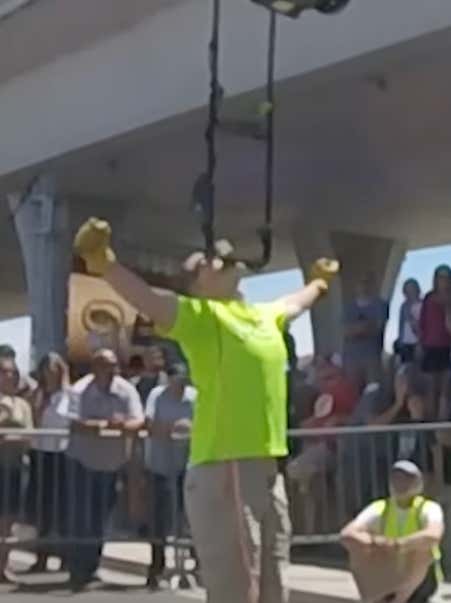 This Guy Who Balanced A Running Lawnmower On His Chin For 9+ Minutes To Set A Guinness World Record Needs His Head Examined