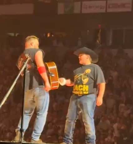 Dudes Rock: Zach Bryan Bringing This Kid On Stage Then Giving Him His Guitar Is Awesome