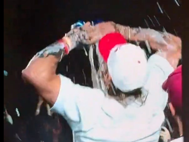 Flawless Execution: George Kittle Caught Two Beers From Brock Purdy While On Stage With Luke Combs And Promptly Turned Into Stone Cold