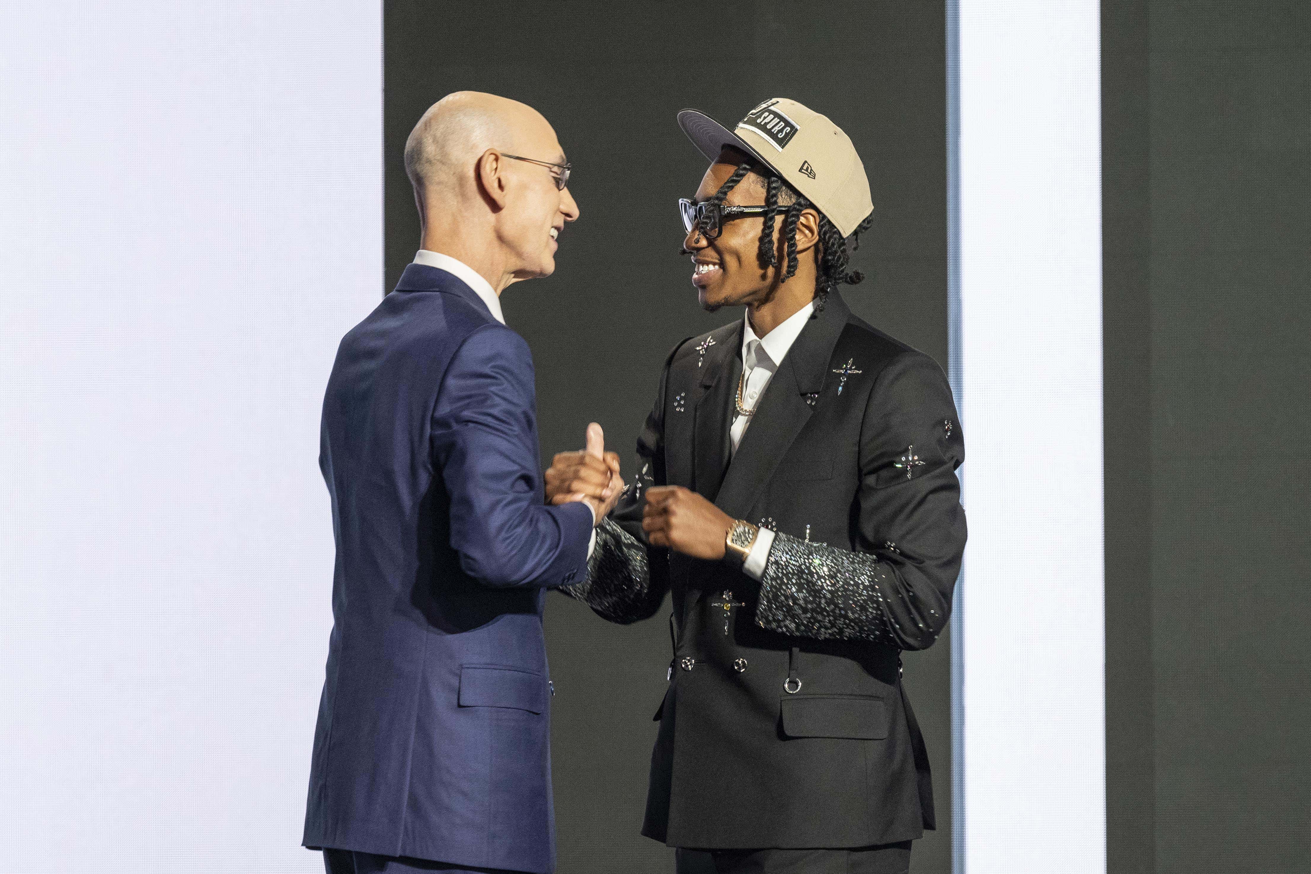 The Awkward Photos Of NBA Draftees Wearing Hats Of Teams They Won't Be Playing For Must Be Stopped