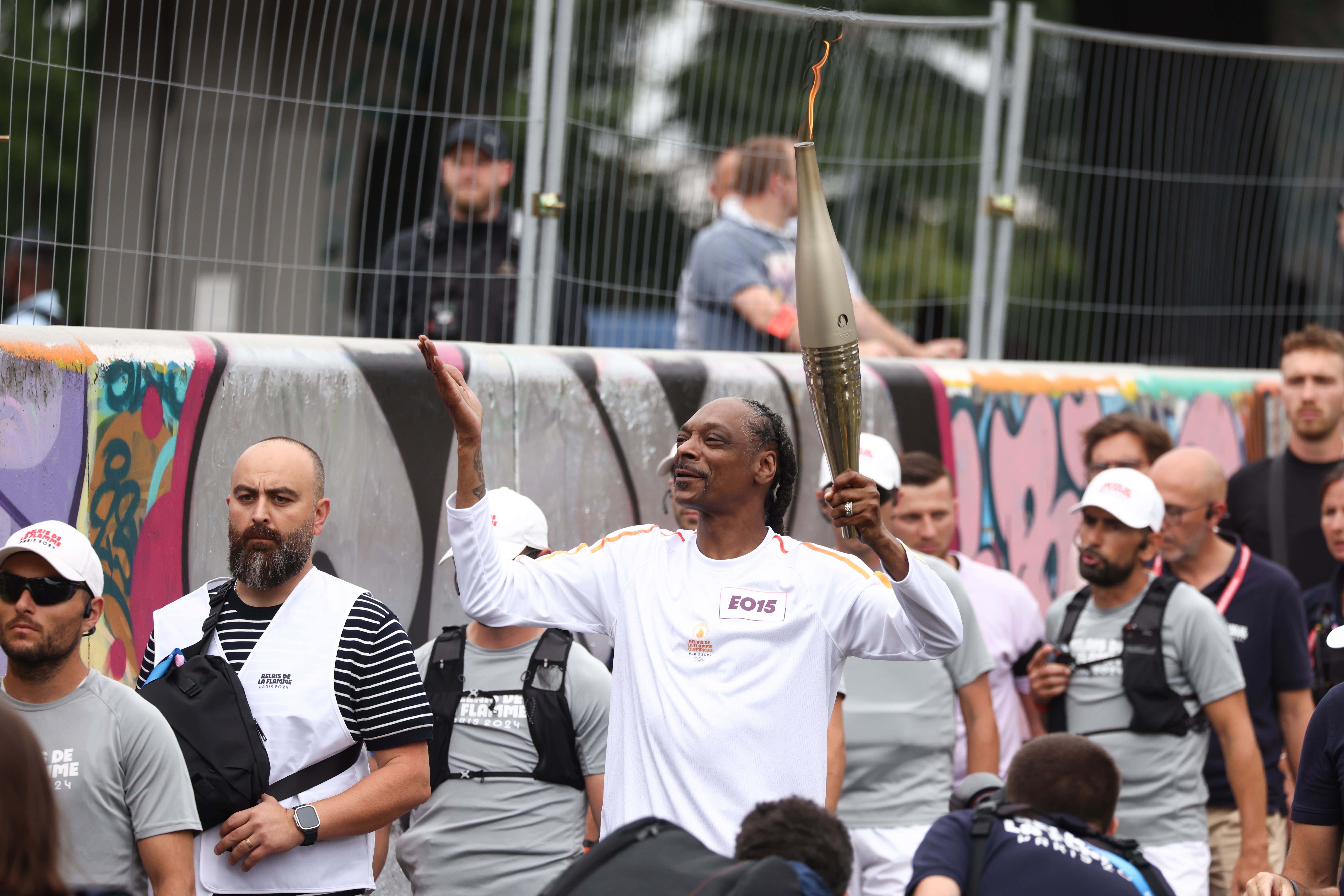 Snoop Dogg Has Fully Infiltrated The Olympics, Was Chosen to Carry The Olympic Torch Through The Streets of Paris