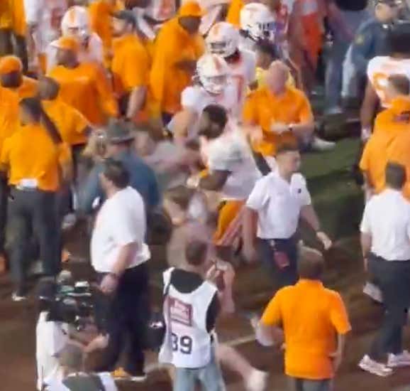 Assault: A 6'4, 325 Pound Tennessee Player Shoved A Storming Arkansas Fan To Bolivian After Their Upset Loss