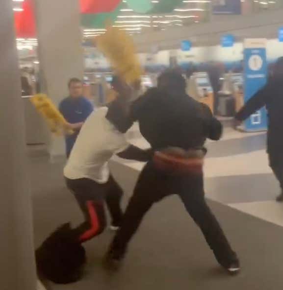 Wild Brawl Breaks Out At O'Hare Airport Involving Wet Floor Signs