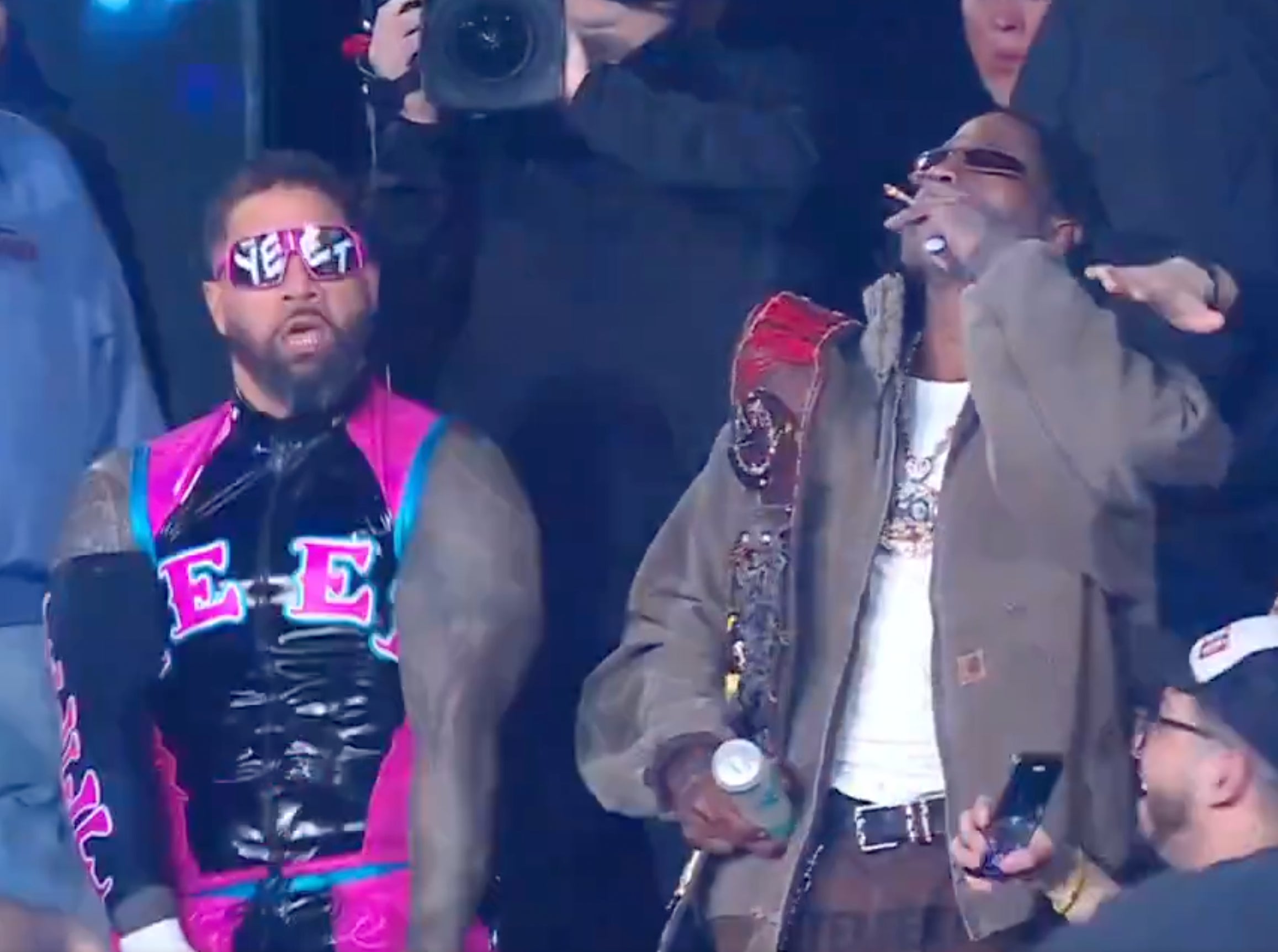 Travis Scott Walking Jey Uso To The Ring On RAW While Smoking A Blunt/Dapping Up Michael Cole Was A Wild Sight To See