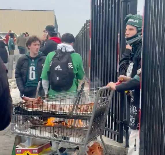 Can't Hold Anything Back Now, Philly Fan Breaks Out Shopping Cart Pig Roast At Eagles Tailgate