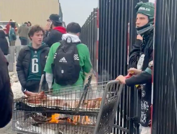 Can't Hold Anything Back Now, Philly Fan Breaks Out Shopping Cart Pig Roast At Eagles Tailgate