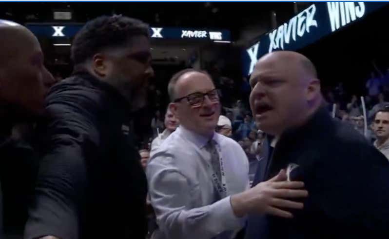 Weird Scene - Ed Cooley Charged Towards A Xavier Fan After The Buzzer, Had To Be Held Back By Assistant Coaches