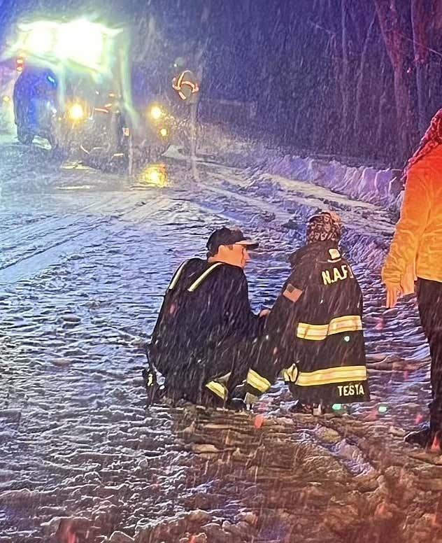 This Viral Photo of a Firefighter Helping a Kid After a Car Crash is Today's Reminder There's Still Hope for Humanity