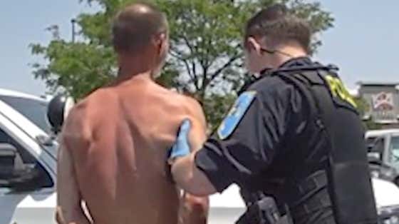 Every Person In This Parking Lot Is A Coward For Not Fighting This Man Who Was Seen Chugging Tobasco Sauce And Allegedly Challenging Random Strangers To Fight