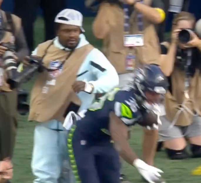 Camera Security Is Job Security - Marshawn Lynch Will Never Waste An Opportunity To Throw A Stiff Arm Around A Football Field