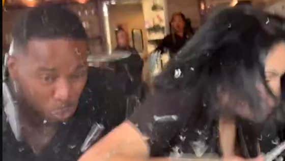 A Couple Of Food Influencers Had Their Review Interrupted By A Goddamn Car Crashing Into Them Through A Window
