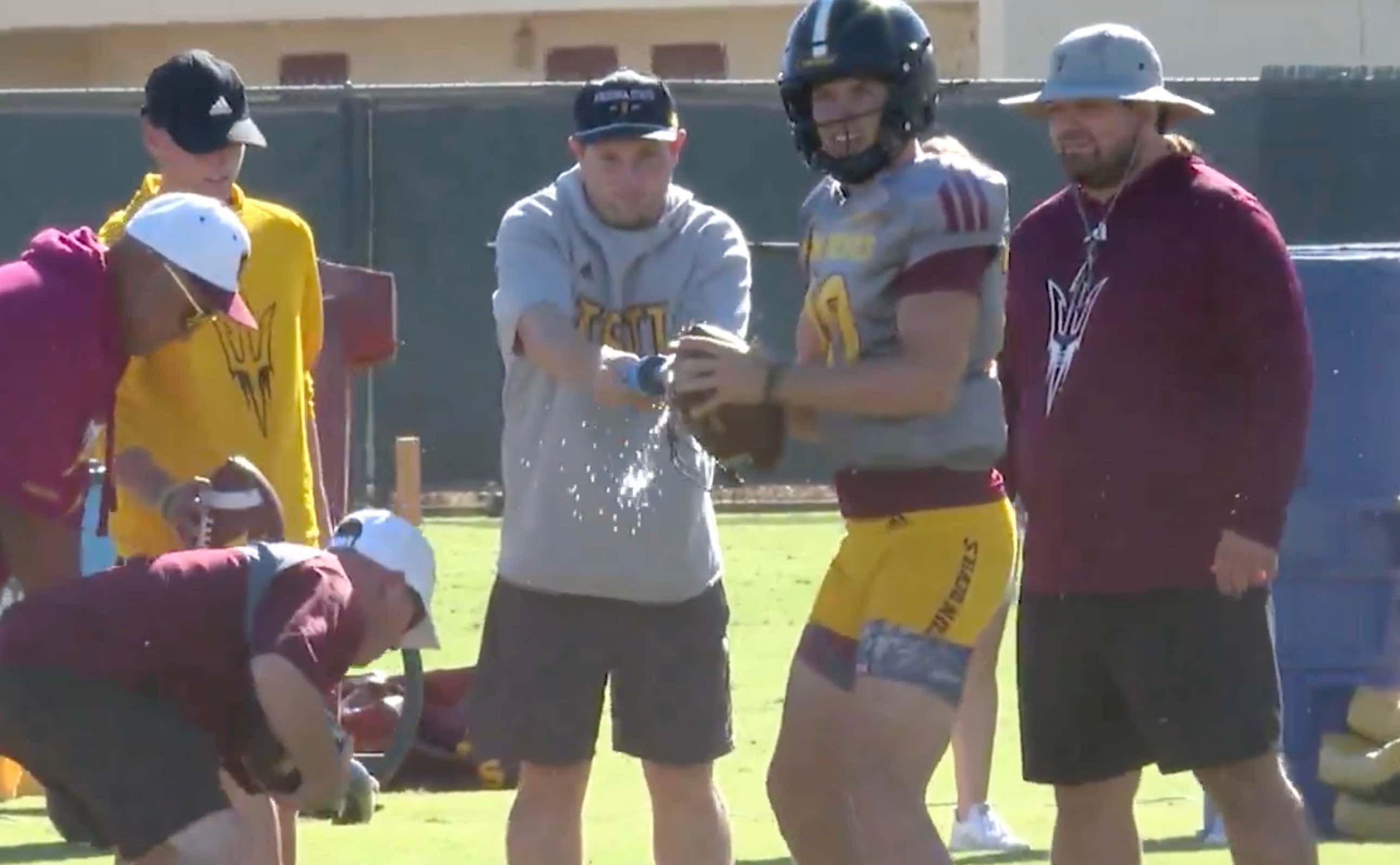 Arizona State Football's "Game Environment Simulation" Practice Methods Are Something Else, Kenny Dillingham is Spraying QB Sam Leavitt's Hands With Water Bottle to Prepare For Rain Storm